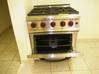Photo for the classified Piano 4 burners gas and gas oven Saint Martin #1