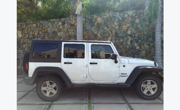 2016 4 door white jeep wrangler (hardtop) - Cars Sint Maarten • Cyphoma