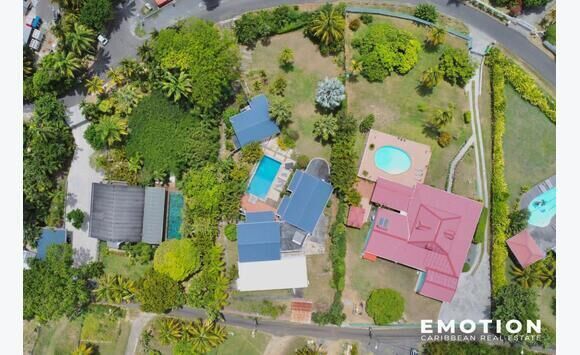 Villa t6 vue mer - 217 m2 + 1 bungalow - Ventes Maison Guadeloupe • Cyphoma